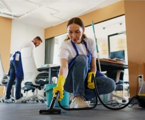 professional-cleaning-service-person-using-vacuum-cleaner-office (2) (1)