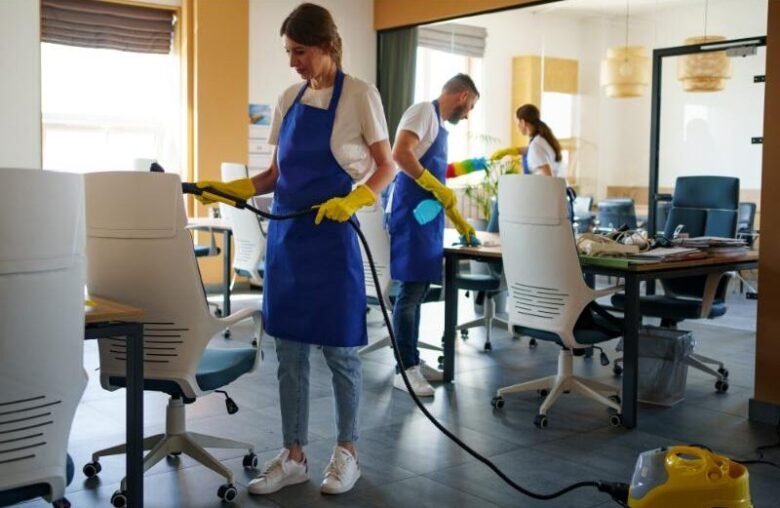 professional-cleaning-service-person-using-vacuum-cleaner-office (3) (1)