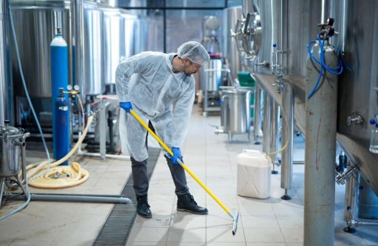 professional-industrial-cleaner-protective-uniform-cleaning-floor-food-processing-plant (1)